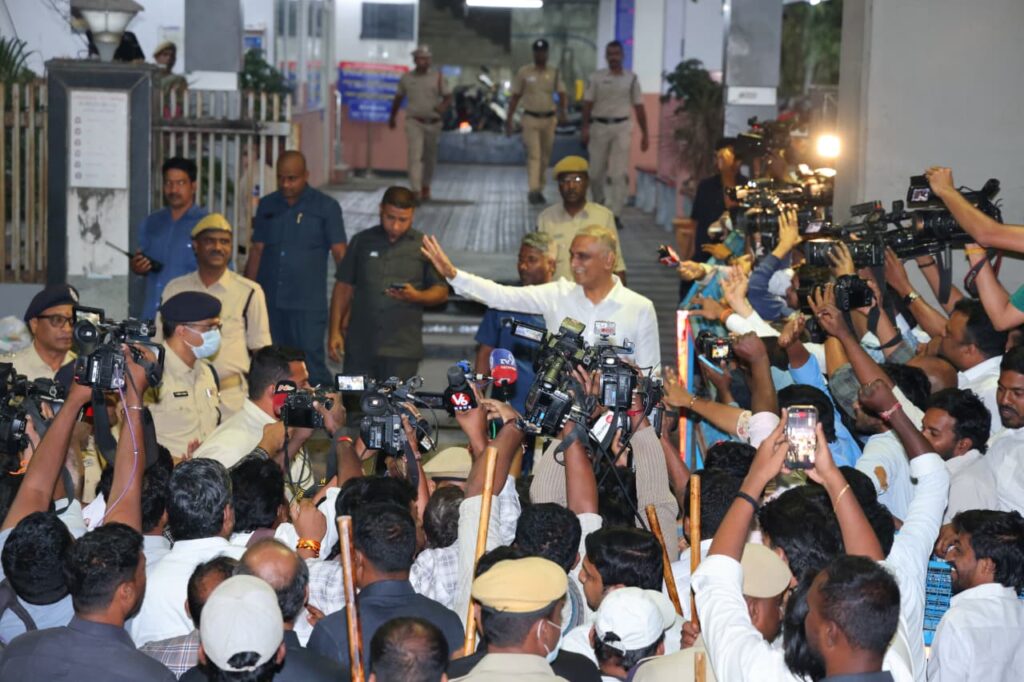 AFTER POLICE ENQUIRY HARISH RAO COMING OUT SIDE