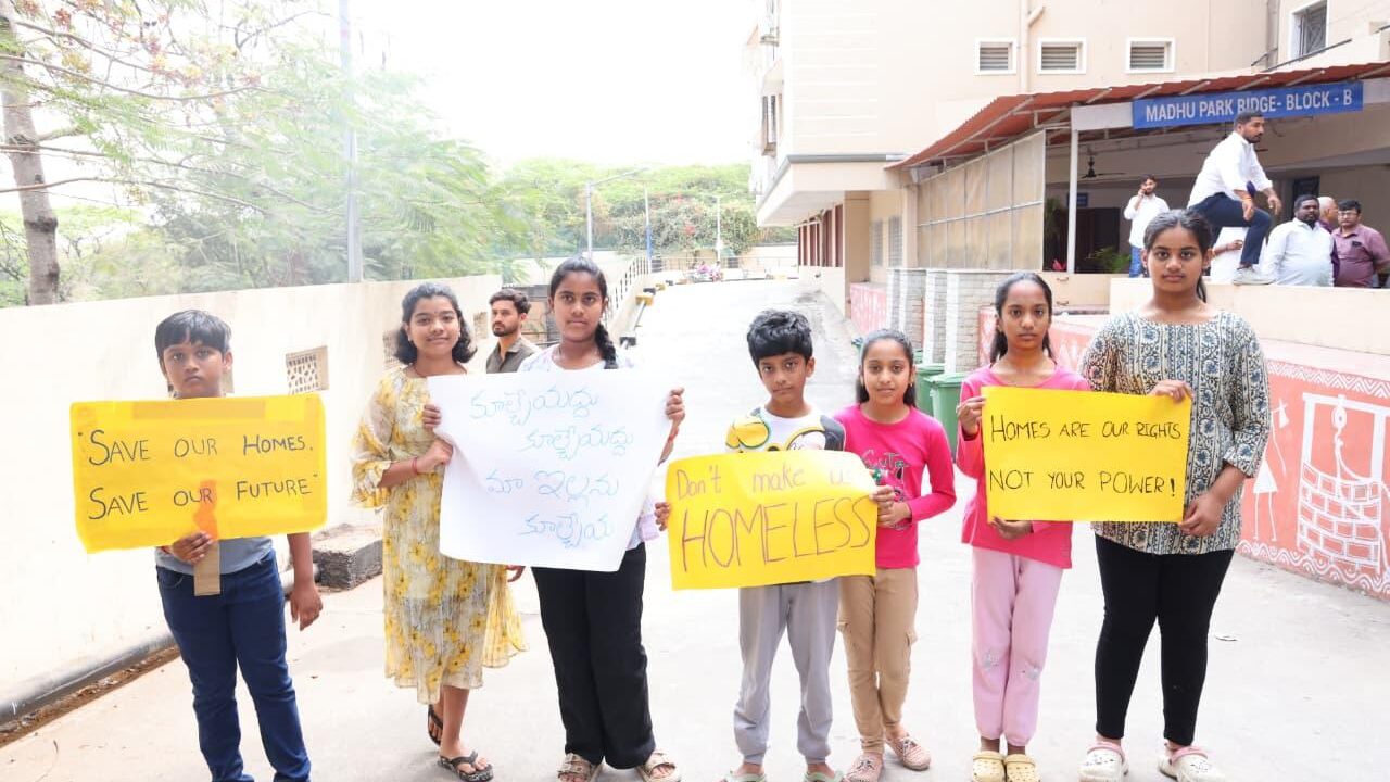 KIDS PROTEST WITH PLA CARDS ON MUSI RIVER FRONT PROJECT