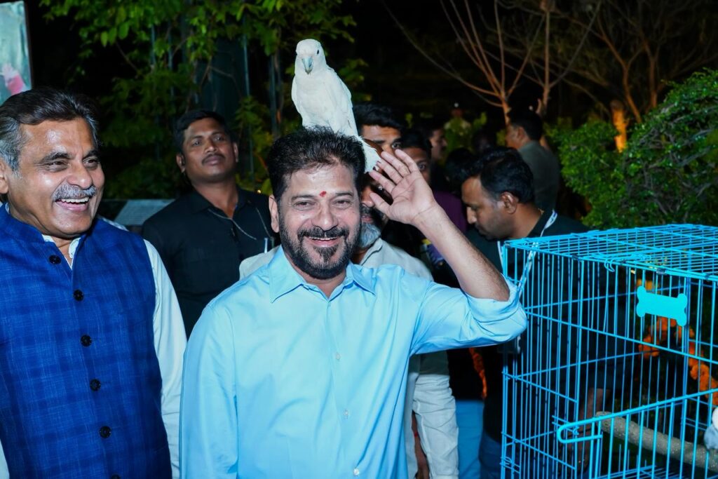 CM REVANTH REDDY WITH WHITE PARROT