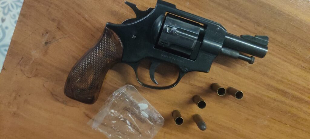 POLICE  HANDEED OVER PISTOL