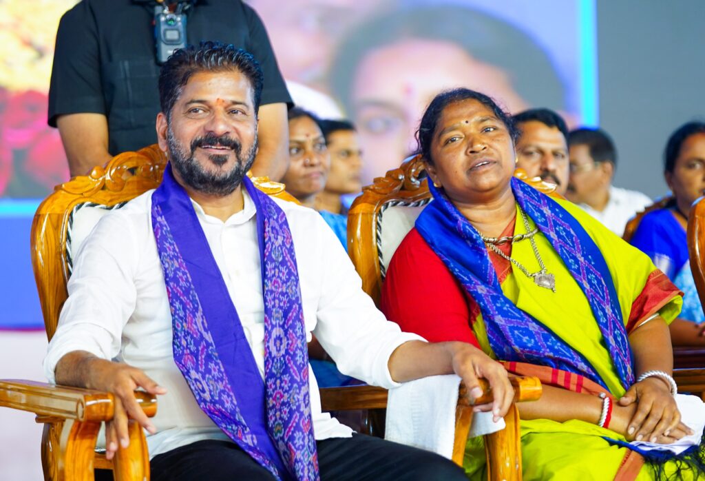 Cm Revanth Reddy with Minister Seetakka